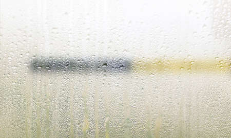 Condensation on the window. Water drops on the glass. Background