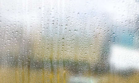 Condensation on the window, close-up. Rain drops on the window.