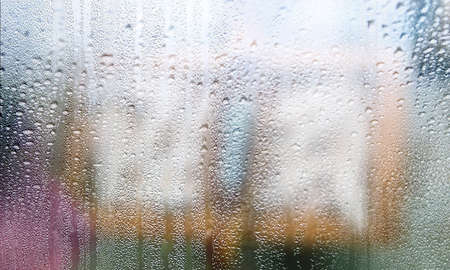 Background with rain drops close up. Rain drops on outdoor window, humid water backdrop, blurred...