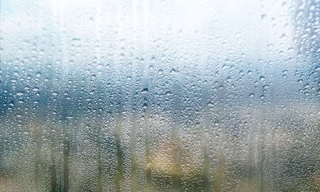 Rain drops on the window. Water drops on the glass, background