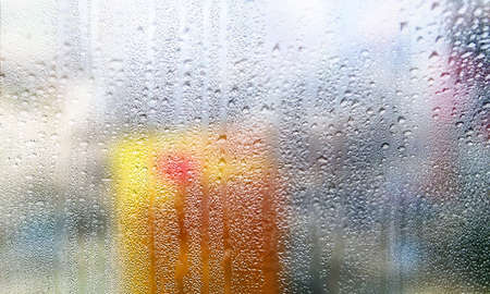 Background with rain drops close up. Rain drops on outdoor window, Closeup view transparent water...