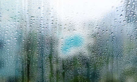 Background with rain drops close up. Rain drops on outdoor window, Closeup view transparent water...