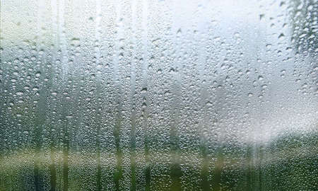 Water drops on the glass. Raindrops on the window. Natural background.