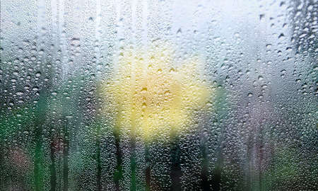 Rain drops on window glass, close up. Rain drops on window glass, natural background