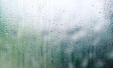 Water drops on the window. Rain drops on the window glass.