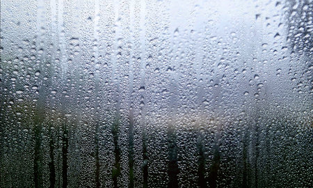 Water drops on the window. Rainy day. Natural background.