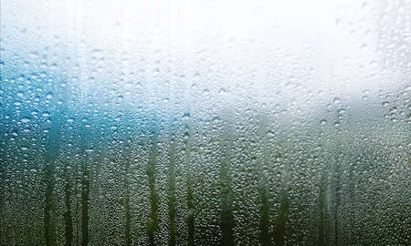 Condensation on the window, close-up. Rain drops on the glass.