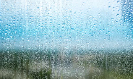 Water drops on the window. Raindrops on the window. Natural background.