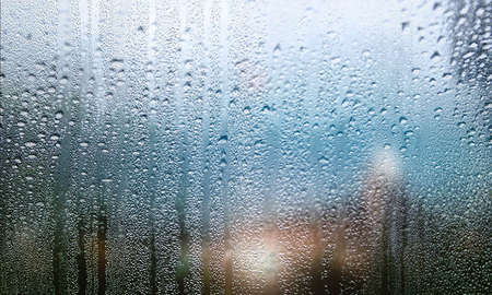 Rain drops on the window, natural background. Rainy weather.