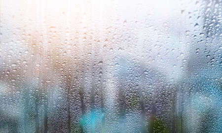 Rain drops on the window. Blurred background. Selective focus.の写真素材