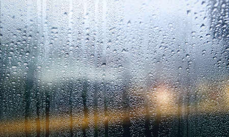 Condensation on the window, water drops on the glass, background