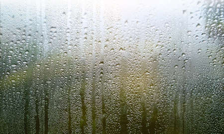 Water drops on the window. Raindrops on the window. Natural background.
