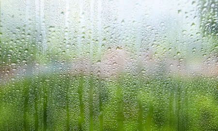Water drops on the glass. Raindrops on the window, natural background.