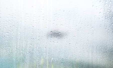 Condensation on the window. Rain drops on the window. Natural background.
