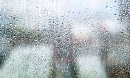 Close-up view of rain drops on window glass. Rainy day