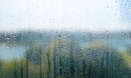 Rain drops on the window, close-up. Rainy weather.の写真素材