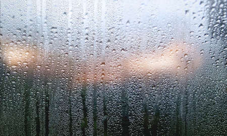 Rain drops on window glass background. Rain drops on window glass.