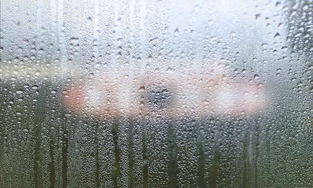 Water drops on the glass. Rain drops on the window. Rainy weather.