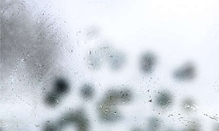 Drops of rain on the window, natural background, rainy weather