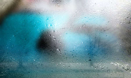 Background with rain drops close up. Rain drops on outdoor window, humid water backdrop, blurred...
