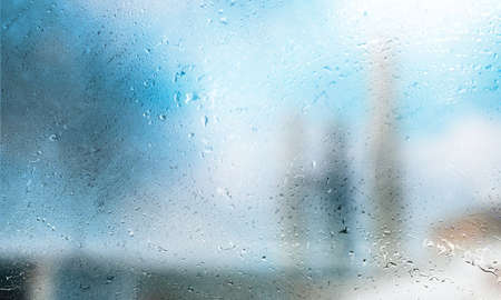 Rain drops on the window, blurred background with copy space for your text
