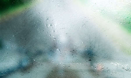 Background with rain drops close up. Rain drops on outdoor window, Closeup view transparent water...