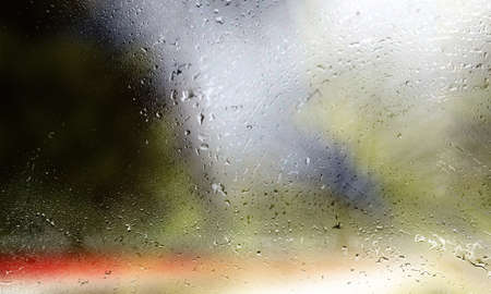 Drops of rain on the window, shallow DOF, abstract background