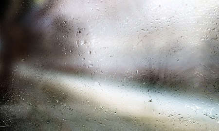 Background with rain drops close up. Rain drops on outdoor window, Closeup view transparent water...