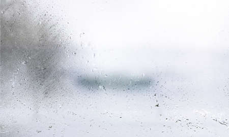 Drops of rain on the window. Condensation on the glass