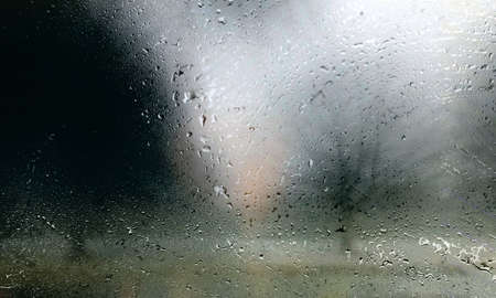 Rain drops on the window, blurred background. Raindrops on the glass.