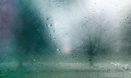 Condensation on the glass. Rain drops on the window. Rainy weather.