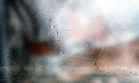Background with rain drops close up. Rain drops on outdoor window, Closeup view transparent water...