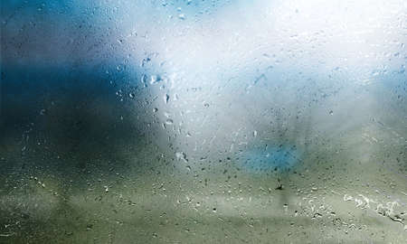 Rain drops on window glass. Raindrops on window glass close up.