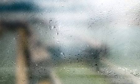 Background with rain drops close up. Rain drops on outdoor window, Closeup view transparent water...