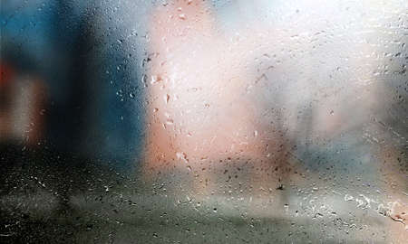 Background with rain drops close up. Rain drops on outdoor window, Closeup view transparent water...