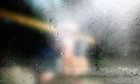 Background with rain drops close up. Rain drops on outdoor window, Closeup view transparent water...