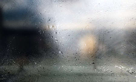 Water drops on the glass. Raindrops on the window, abstract backgroundの写真素材