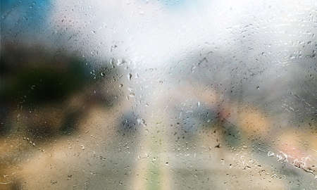 Background with rain drops close up. Rain drops on outdoor window, Closeup view transparent water...