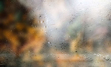 Background with rain drops close up. Rain drops on outdoor window, Closeup view transparent water...