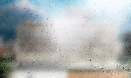 Background with rain drops close up. Rain drops on outdoor window, Closeup view transparent water...