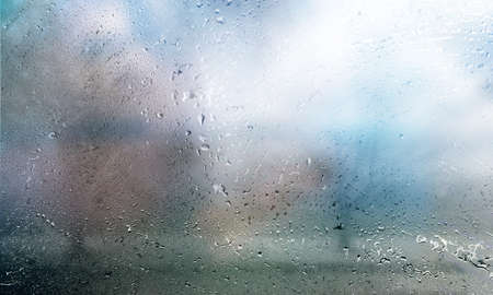 Background with rain drops close up. Rain drops on outdoor window, humid water backdrop, blurred...