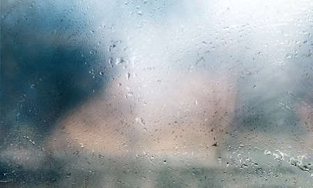 Background with rain drops close up. Rain drops on outdoor window, Closeup view transparent water...