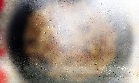 Drops of rain on the window, close-up view.
