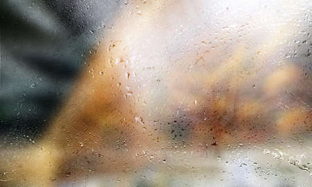 Background with rain drops close up. Rain drops on outdoor window, Closeup view transparent water...