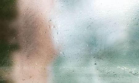 Background with rain drops close up. Rain drops on outdoor window, humid water backdrop, blurred...