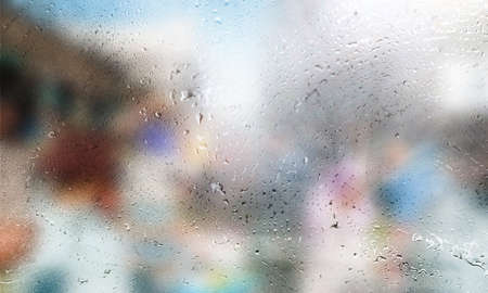 Background with rain drops close up. Rain drops on outdoor window, Closeup view transparent water...