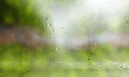 Rain drops on the glass. Raindrops on the window, natural background