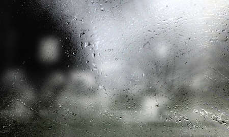 Drops of rain on the window, shallow depth of field.