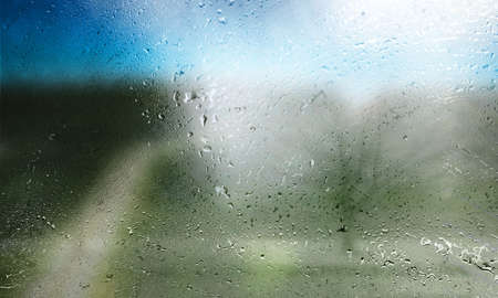 Background with rain drops close up. Rain drops on outdoor window, Closeup view of rain drops on...
