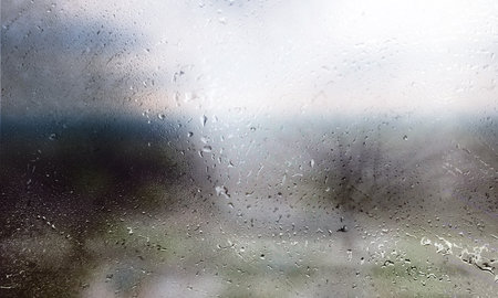 Background with rain drops close up. Rain drops on outdoor window, Closeup view transparent water...